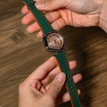 Green-Saffiano-Strap-with-Orange-Edge-on-Grandeur-Strange-made-by-Gunny-Straps