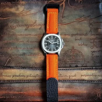 Orange-Canvas-strap-hook-loop-with-Extreme-Padding-on-patek-philippe-aquanaut-made-by-Gunny-Straps