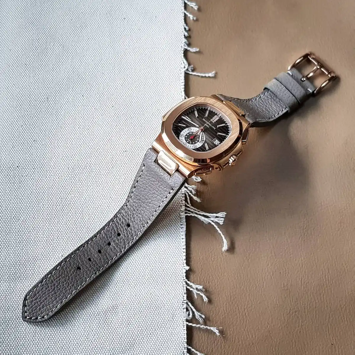 pebble-grey-leather-strap-on-patek-philippe-nautilus-made-by-gunny-straps