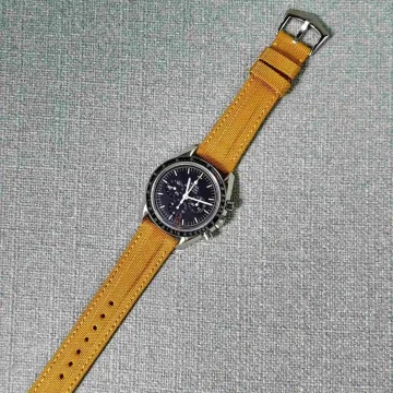 Kevlar Mustard Strap on Omega Speedmaster by Gunny Straps
