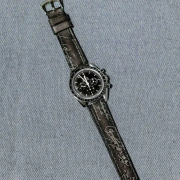 Black Patina with Silver Scritto Strap on Omega Speedmaster by Gunny Straps