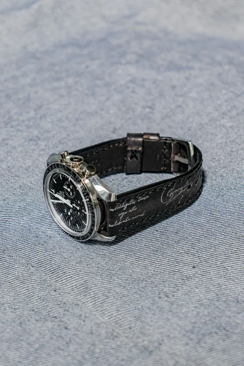 Black Patina with Silver Scritto Strap on Omega Speedmaster by Gunny Straps