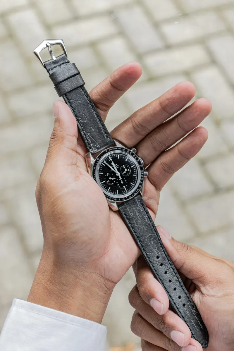 Black Patina with Silver Scritto Strap on Omega Speedmaster by Gunny Straps