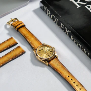 Gold Patina Scritto Strap on Rolex Daydate Gold made by Gunny Straps