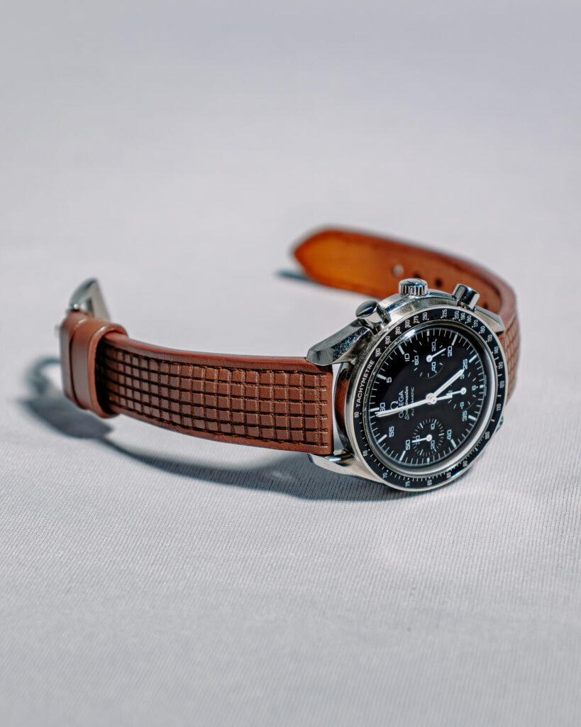 Chessboard Mocha Strap on Omega Speedmaster - Gunny Straps
