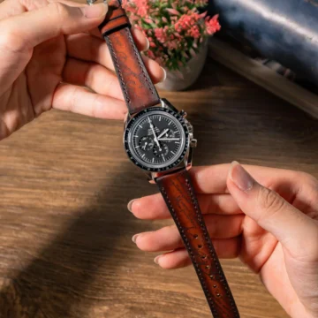 Dark-brown-patina-scritto-strap-on-Omega-Speedmaster-made-by-Gunny-Straps