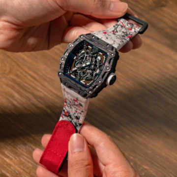 Kevlar White Paint Splat Strap with Red Hook & Loop on Ofteq watch made by Gunny Straps