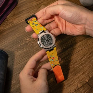 Yellow-kevlar-paint-splat-strap-with-hook-and-loop-on-Patek-Philippe-Nautilus-made-by-Gunny-Straps