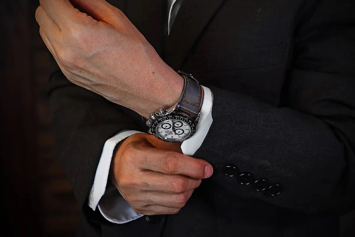 Mission Possible 3 strap on Rolex Daytona Ceramic Panda watch