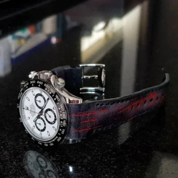 Black Patina with Red Scritto Strap on Rolex Daytona Ceramic Panda made by Gunny Straps