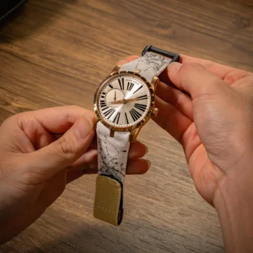 White-kevlar-paint-splat-strap-with-sand-flap-on-Roger-Dubuis-watch