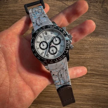 White-kevlar-paint-splat-with-brown-flap-on-Rolex-Daytona-Ceramic-Panda-made-by-Gunny-Straps