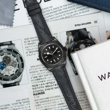 Grey-patina-scritto-strap-on-Tudor-black-bay-ceramic-made-by-Gunny-Straps